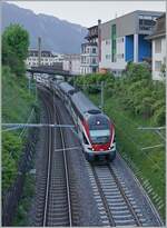 Die SBB RABe 511 114 und 115 erreichen als RE33 nach Annemasse Montreux. 

29. April 2025  