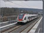 Der SBB RABe 522 209 erreicht den zur Wiederinbetriebnahme (ab 9.12.2018) der Strecke nach Belfort komplet neu gestalteten Bahnhof Delle.