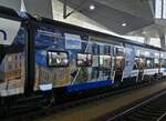Die Zwischenwagen des Triebzuges Smile, der WESTbahn, sind alle mit sch�nen Motiven beklebt, aufgenommen im HBF Wien.