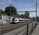 4 Geleise, 3 Strecken, 2 Stromsysteme und 1 Zug - zwischen St-Jean und Gen�ve ist der SBB LEX RABe 522 228 als RL5 23042 auf der Fahrt von Gen�ve nach La Plaine.