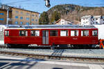  Der RhB Triebwagen ABe 4/4 II 46 wird am 22.03.2023 in Pontresina an einen Bauzug gekuppelt.