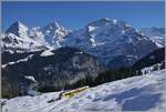 Vor der imposanten Kulisse von Eiger, Mönch und Jungfrau ist der BLM Be 4/6 103  Jungfrau  als R66 zwischen Winteregg und Grüschalp auf der Fahrt von Mürren nach der Grütschalp.