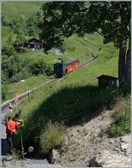 BRB Brienz Rothornbahn/514981/auf-der-station-planalp-wird-der Auf der Station Planalp wird der Gegenzug erwartet.
7. Juli 2016