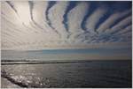 Wolken verteilen sich fächerartig über den Himmel bei Wustrow
(23.09.2017) 