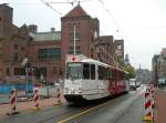  Red Crosser-Strassenbahn  3001 (ex-GVBA 767) Damrak, Amsterdam 24-09-2014.